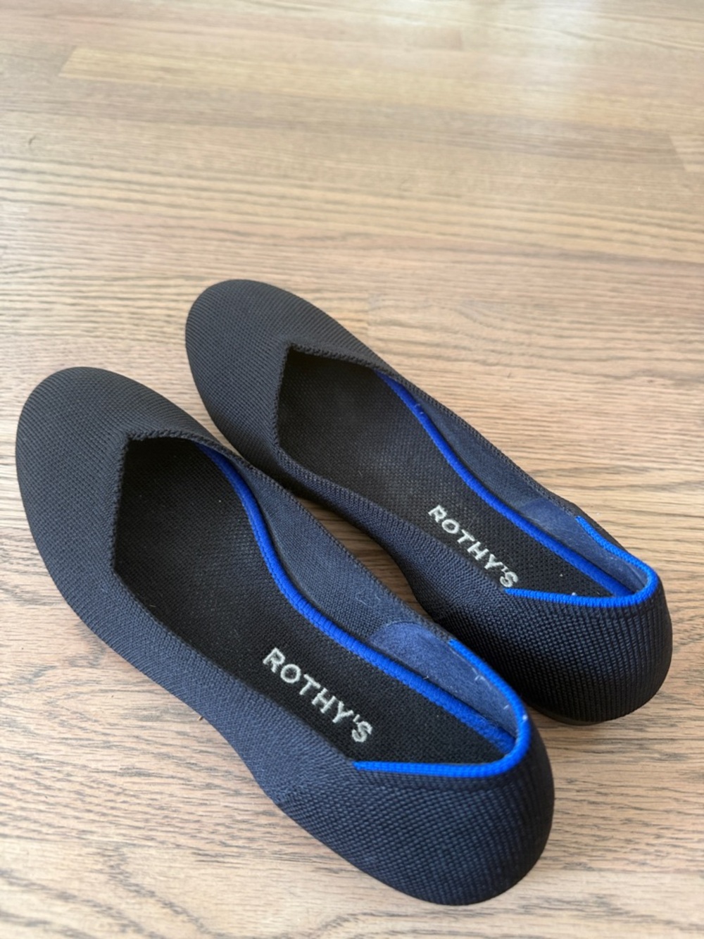 Rothy's Black Flats with Blue Trim